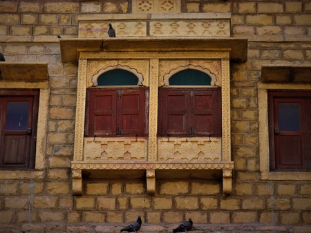 Indian doors and windows. House facade.の写真素材