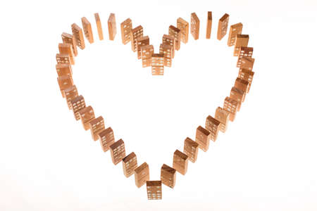 Dominoes standing in heart shapeの写真素材