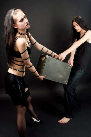 extravagant provoking emo gothic couple playing role game isolatedの写真素材