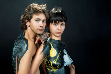 sensual young caucasian couple standing together isolated の写真素材