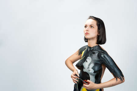 beauty caucasian girl with painting isolated with copy space の写真素材