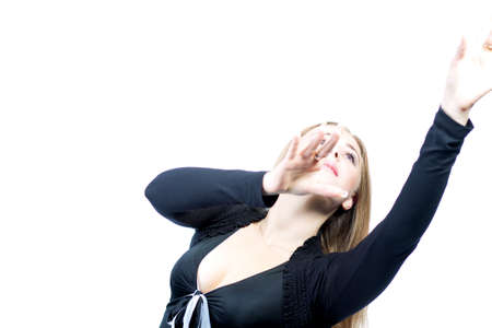 young blond caucasian female standing with hands longing forward with passion isolated on white