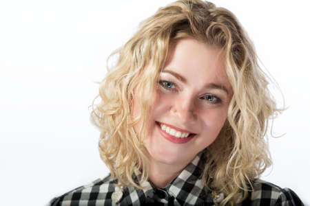closeup of happy caucasian blond girl isolated on whiteの写真素材