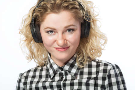 closeup portrait of young caucasian blond in headphones の写真素材