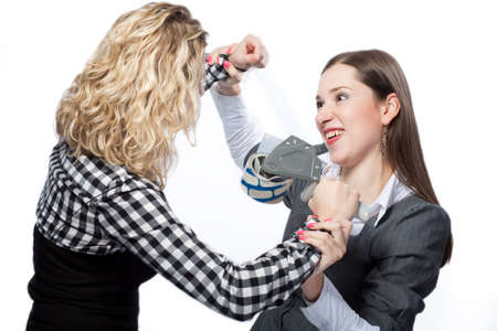 young caucasian girls playing with tape isolated の写真素材