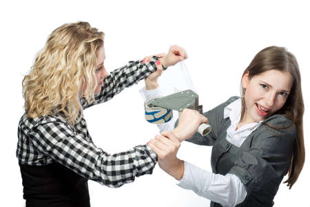 two young caucasian girls having fun with scotch isolated の写真素材