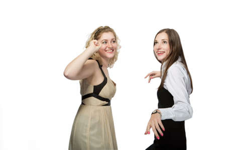 two nice girlfriends having fun isolated on white bsckground の写真素材