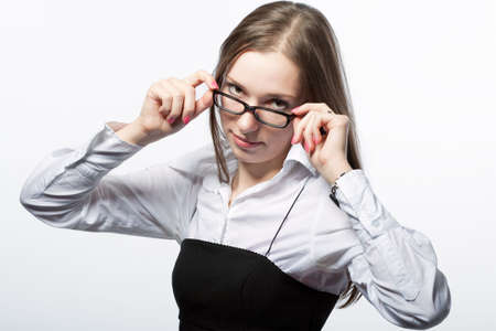 young business woman in glasses isolated on white の写真素材