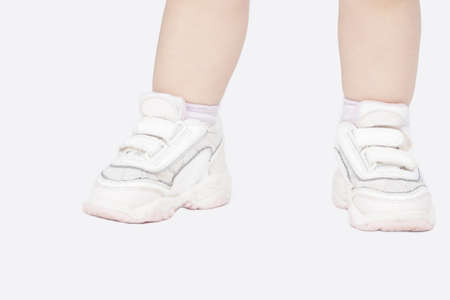 closeup of legs of little caucasian girlの写真素材