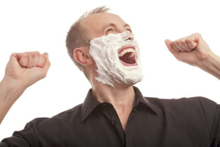 young handsome exclaiming isolated over white backgroundの写真素材