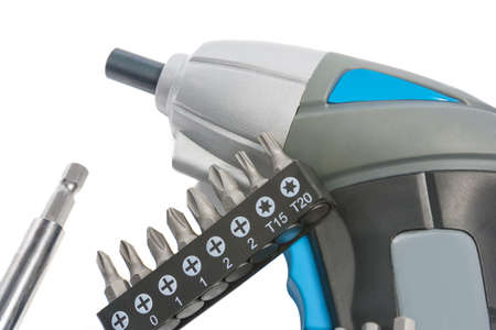 portarble electric accumulator screwdriver with spare tools,  isolated over white background....