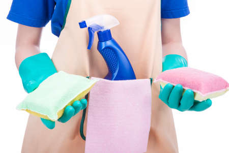 Cleaning Concept: Female hands Holding Cleaning Staff and Equipment. Isolated Over White. Horizontal...