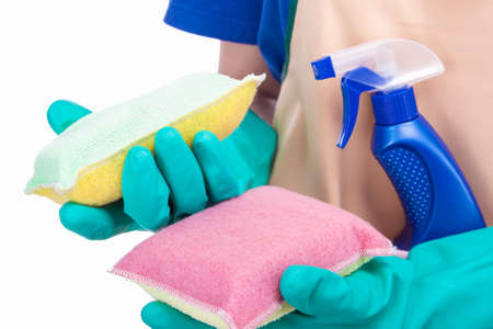 Cleaning Concept: Female hands Holding Cleaning Staff and Equipment. Isolated Over White. Horizontal...