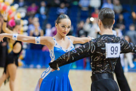 MINSK-BELARUS, FEBRUARY, 9: Unidentified Dance Couple Performs Youth-2 Latin-American Program on Ogni Stolicy (Lights of the Capital) 2014 WDSF  Championship on February, 9, 2014, in Minsk, Republic of Belarusのeditorial素材