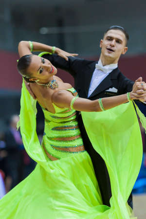 MINSK-BELARUS, FEBRUARY, 9: Andrey Kitcun-Nataliya Korsak perform Adult Standard European Program on Ogni Stolicy (Lights of the Capital) 2014 WDSF  Championship on February, 9, 2014, in Minsk, Republic of Belarusのeditorial素材