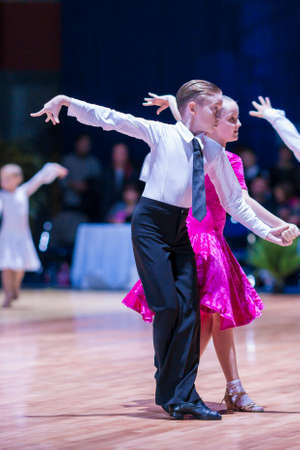 Minsk-Belarus, October 18, 2014: Unidentified Dance Couple Performs Juvenile Latin-American Program on IDSA World Open Championship 2014 in October 18, 2014, in Minsk, Republic of Belarusのeditorial素材