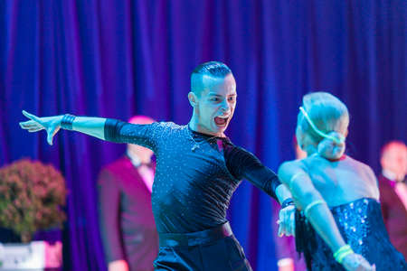 Minsk-Belarus, October 18, 2014: Egor Kosyakov-Anastasiya Belmach perform Adult Latin-American Program on on IDSA World Open Championship 2014 in October 18, 2014, in Minsk, Republic of Belarusのeditorial素材