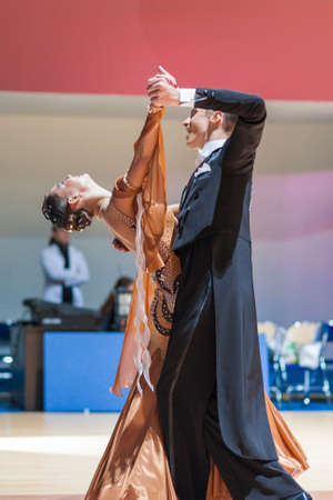 Minsk-Belarus, October 19, 2014: Unidentified Dance Couple performs Adult Standard European Program...