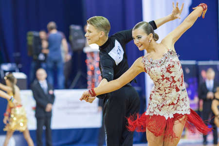 Minsk-Belarus, October 4,2014: Unidentified Professional dance couple performs Youth-2 Latin-American program on World Open Minsk-2014 WDSF Championship in October 4, 2014 in Minsk, Republic Of Belarusのeditorial素材