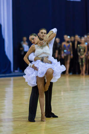 Minsk-Belarus, October 4,2014: Unidentified Professional dance couple performs Adult Latin-American program on World Open Minsk-2014 WDSF Championship in October 4, 2014 in Minsk, Republic Of Belarusのeditorial素材