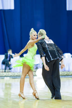 Minsk-Belarus, October 4,2014: Unidentified Professional dance couple performs Adult Latin-American program on World Open Minsk-2014 WDSF Championship in October 4, 2014 in Minsk, Republic Of Belarusのeditorial素材