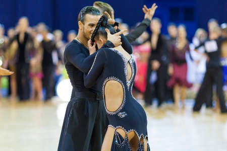 Minsk-Belarus, October 4,2014: Unidentified Professional dance couple performs Adult Latin-American program on World Open Minsk-2014 WDSF Championship in October 4, 2014 in Minsk, Republic Of Belarusのeditorial素材