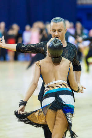 Minsk-Belarus, October 4,2014: Unidentified Professional dance couple performs Adult Latin-American program on World Open Minsk-2014 WDSF Championship in October 4, 2014 in Minsk, Republic Of Belarusのeditorial素材