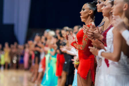 Minsk-Belarus, October 4, 2014: Dance couples standing prior to the WDSF World Open Minsk Championship 2014 start-off in October 4, 2014, in Minsk, Republic of Belarusのeditorial素材
