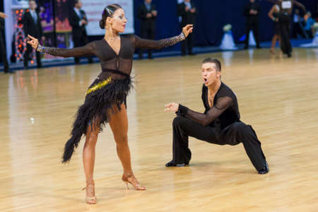 Minsk-Belarus, October 4,2014: Unidentified Professional dance couple performs Adult Latin-American program on World Open Minsk-2014 WDSF Championship in October 4, 2014 in Minsk, Republic Of Belarusのeditorial素材