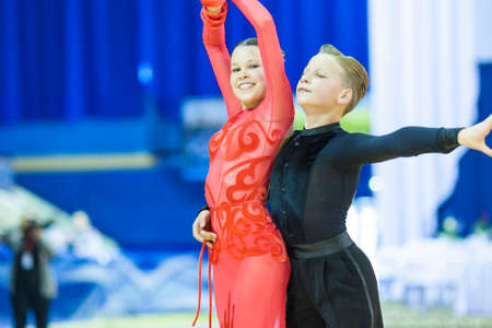Minsk-Belarus, October 5,2014: Unidentified Professional dance couple performing Youth-2 Latin-American program on World Open Minsk-2014 WDSF Championship in October 5, 2014 in Minsk, Republic Of Belarusのeditorial素材