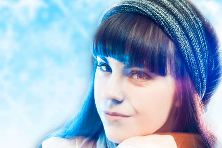 Young Sensual Brunette Woman Wearing Winter Hat Over Winter Cold Background. Horizontal Image...