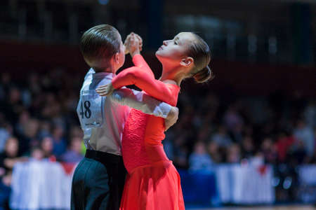 Minsk-Belarus, December 20,2014: Ivanov Nikita and Gurova Evgeniya perform Juvenile-1 Standard European program on Gold of The Capital International IDSA Tournament on December 20, 2014, in Minsk, Republic of Belarusのeditorial素材