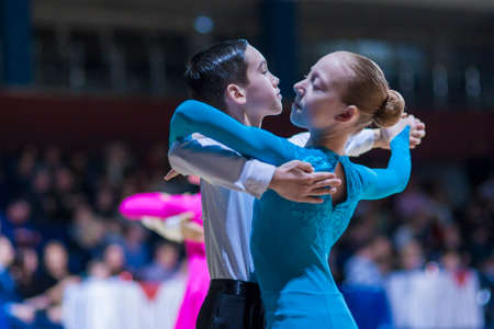 Minsk-Belarus, December 20,2014: Pereverzev Marat and Ratomskaya Anna perform Juvenile-1 Standard European program on Gold of The Capital International IDSA Tournament on December 20, 2014, in Minsk, Republic of Belarusのeditorial素材