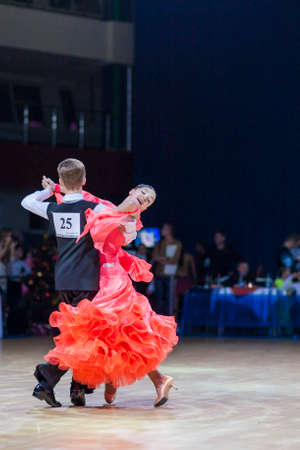 Minsk-Belarus, December 20,2014: Radkevich Nikita and Hut Evgeniya perform Juvenile-1 Standard European program on Gold of The Capital International IDSA Tournament on December 20, 2014, in Minsk, Republic of Belarusのeditorial素材