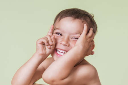 Portrait of Happy Laughing Caucasian Boy. Horizontal Image Composition