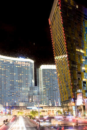 Las Vegas Center Modern Buildings. High Point Shot. Blurred Motion. Long Exposure Night Shot. Vertical Image Compositionのeditorial素材