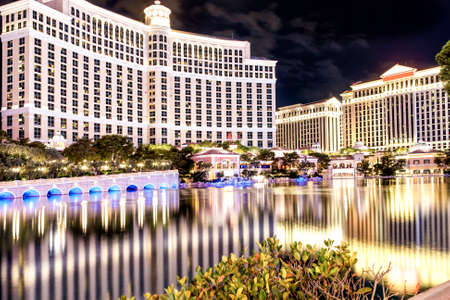 Luxurious Modern Las Vegas Hotel At Night.Long Exposure. Water Reflections. Horizontal Image Compositionのeditorial素材