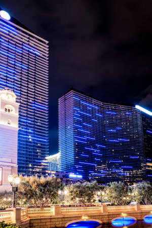 Modern Hotel Buildings in Las Vegas City at Night. Long Exposure. Vertical Image Compositionのeditorial素材