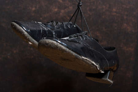 Closeup Shot of Pair of Wornout Standard European Ballroom Dance Shoes. Against Black Background....