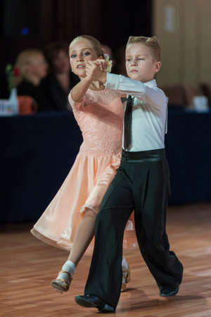 Minsk, Belarus-September 26, 2015: Starkov Arseniy and Popko Anastasiya Perform Juvenile-1 Standard Program on III International IDSA World Dance Championship Capital Cup Minsk- 2015 on September 26, 2015, in Minsk, Belarusのeditorial素材