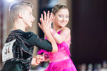 Minsk, Belarus âSeptember 26, 2015: Volkov Iliya and Artemieva Ekaterina Perform Juvenile-1 Latin-American Program on III International IDSA World Dance Championship Capital Cup Minsk- 2015 on September 26, 2015, in Minsk, Belarusのeditorial素材