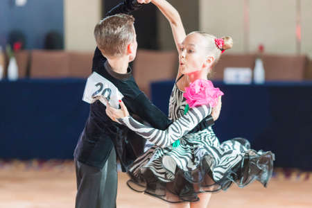 Minsk, Belarus â€“September 26, 2015: Degilevich Artem and Golub Kseniya Perform Juvenile-1...