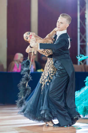 Minsk, Belarus-September 26, 2015: Uglanov Alexey and Trigubko Alena Perform Juniors-2 Standard Program on III International IDSA World Dance Championship Capital Cup Minsk- 2015 on September 26, 2015, in Minsk, Belarusのeditorial素材
