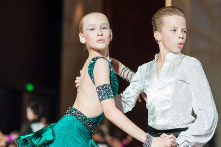 Minsk, Belarus âSeptember 26, 2015: Kolesnev Nikita and Lutsenko Dariya Perform Juvenile-1 Latin-American Program on III International IDSA World Dance Championship Capital Cup Minsk- 2015 on September 26, 2015, in Minsk, Belarusのeditorial素材