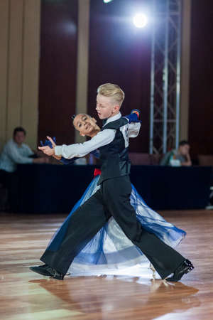 Minsk, Belarus-September 27, 2015: Prahov Ivan and Sackevich Ekaterina Perform Juvenile-1 Standard Program on III International IDSA World Dance Championship Capital Cup Minsk- 2015 on September 27, 2015, in Minsk, Belarusのeditorial素材