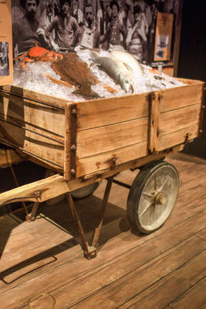San-Francisco-United States, July 13, 2014: Authentic Wharf Ice Cart Used to Move Fish and Ice on Stand in Maritime Museum in San-Francisco on July 13, 2014 in San-Francisco, California, United States Of America.のeditorial素材
