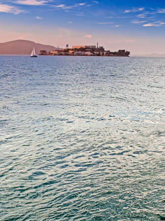 Alkatraz Island and Former United States Penitentiary Prison offshore of San-Francisco. Vertical Image Orientationの写真素材