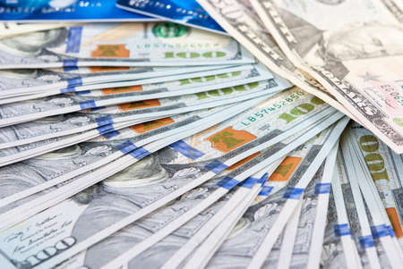 Money and Finances Concept. Plenty of US Banknotes With Plastic Cards. Horizontal Image Composition