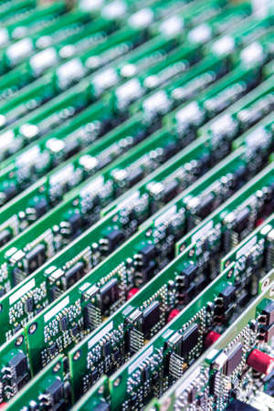 Lots of Printed Circuit Boards With Mounted and Soldered Componentry Arranged in Rows Together....
