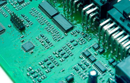 Closeup of Printed Circuit Board with Mounted Components. Horizontal Image Orientation